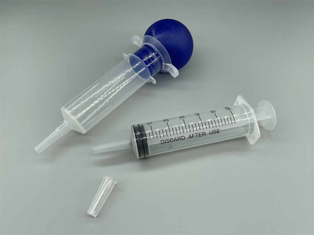 Syringe irrigator